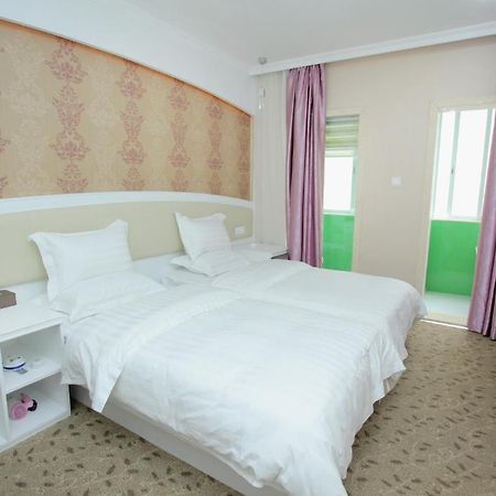 Xinghe Xinfeng Hotel Guangzhou Quarto foto