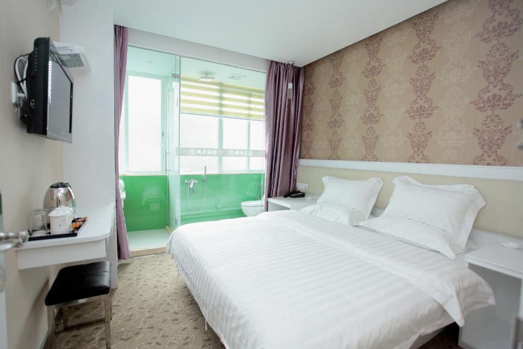 Xinghe Xinfeng Hotel Guangzhou Quarto foto