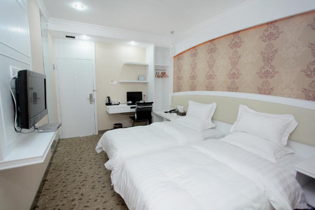 Xinghe Xinfeng Hotel Guangzhou Quarto foto